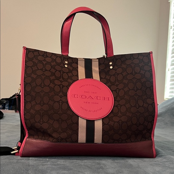Coach Handbags - Coach EUC Dempsey 40 Brown Signature Canvas large Tote with Pink Trim.